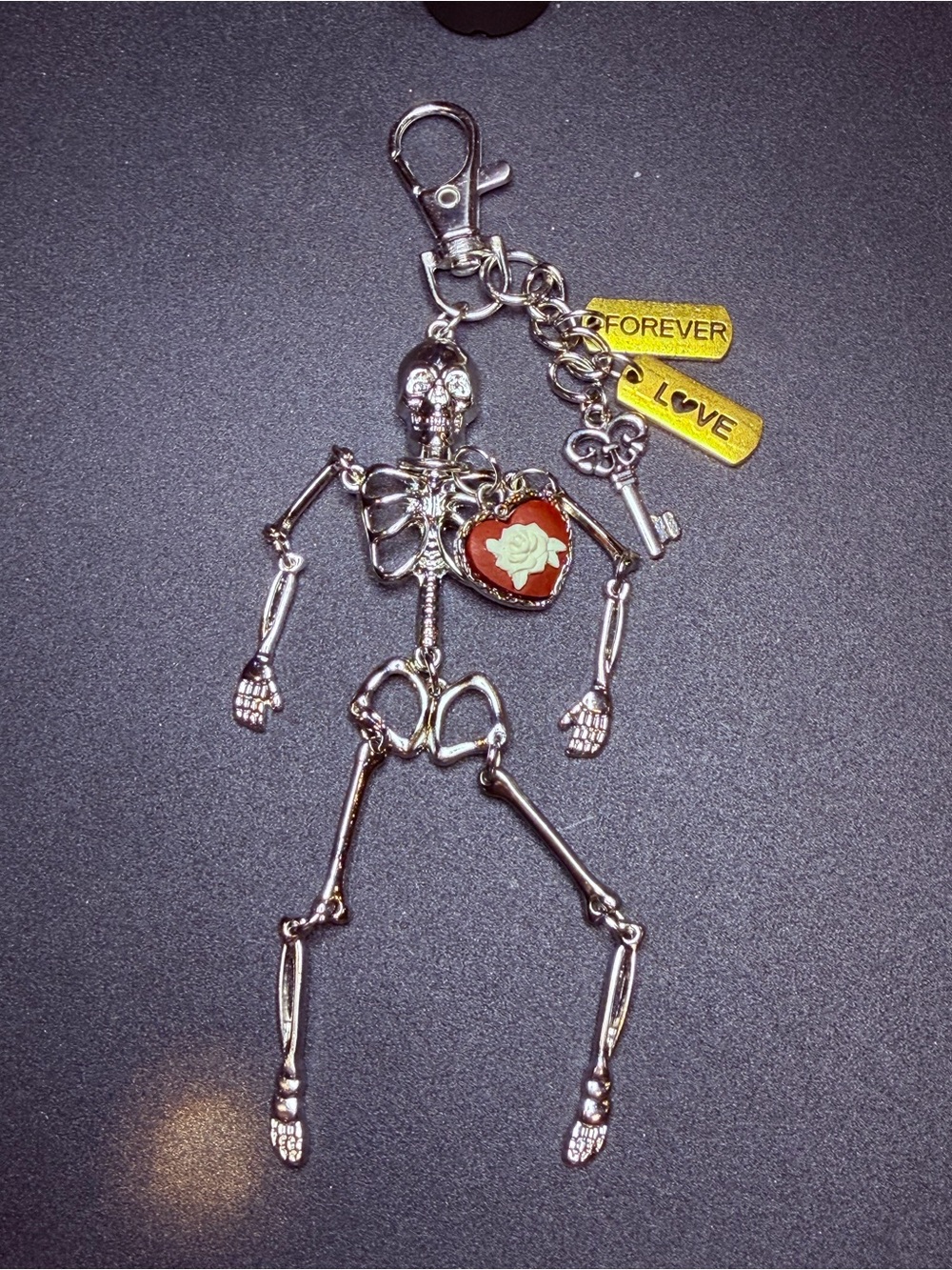 Silver Skeleton Keychain with Red Heart and Gold Tags